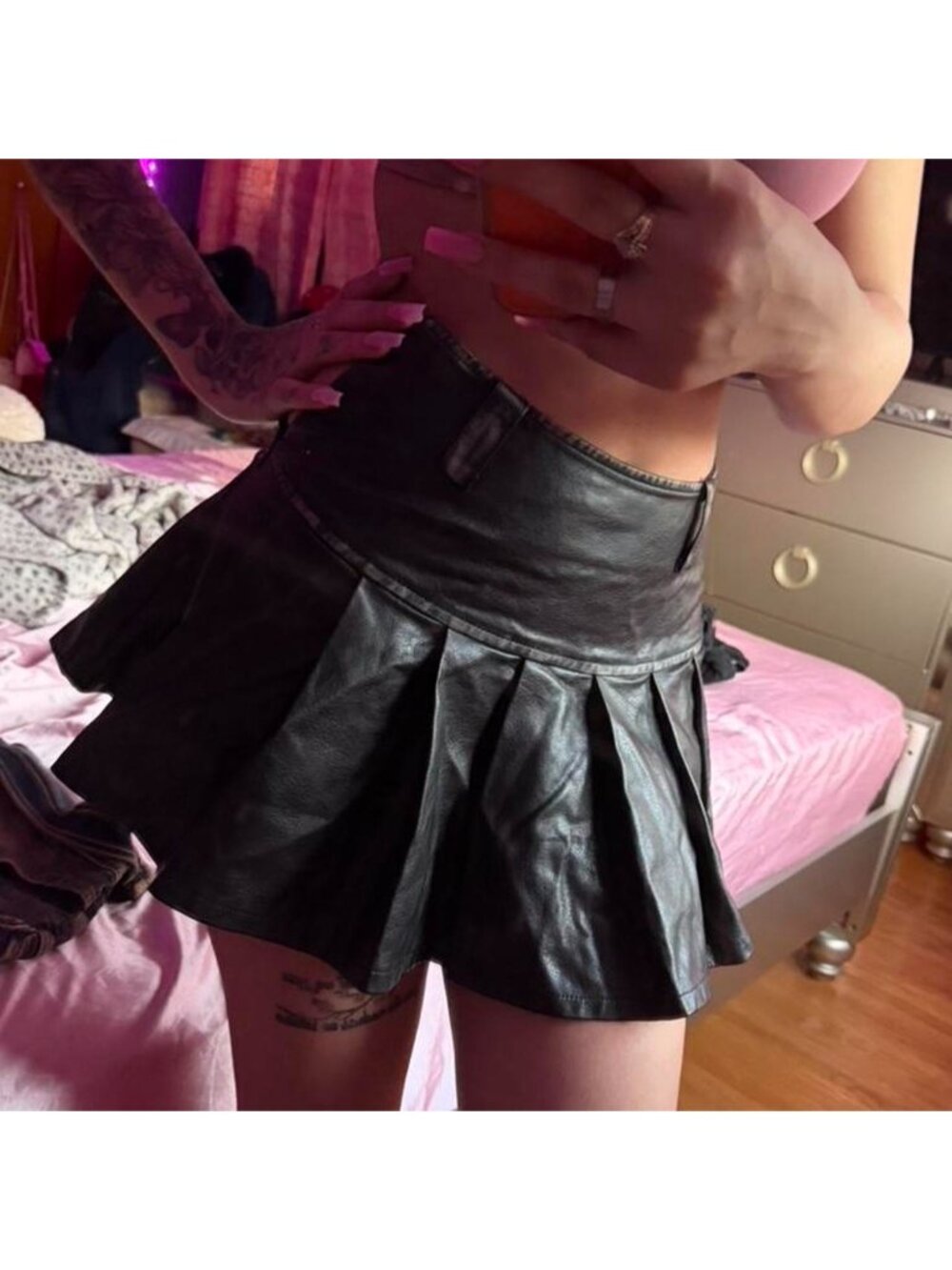 Black leather pleated mini skirt from Fashion Nova